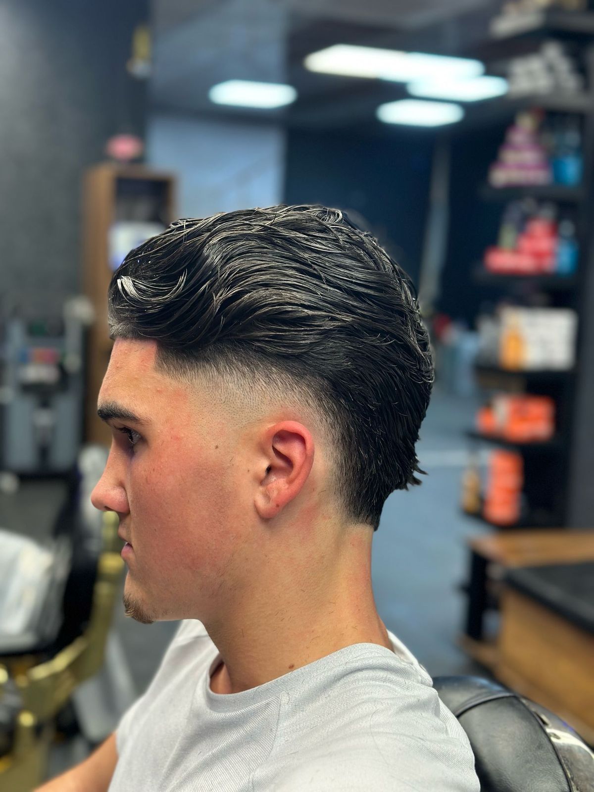 Slick back met mid fade